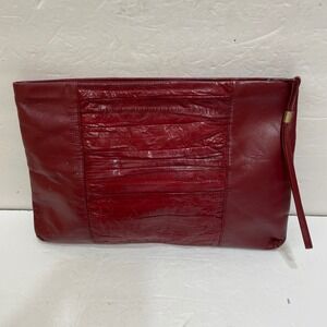 VINTAGE SUNCO GENUINE EELSKIN BAG IN DEEP RED